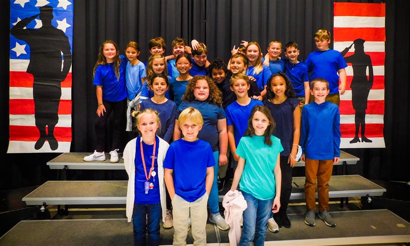 Students sing in Veterans Day performance